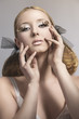 Foto: young girl with creative make-up young girl with creative make-up