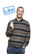 Man holding a social media sign smiling