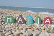 Foto: Maria, female name on colourful stones Maria, female name on colourful stones