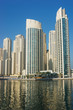 Modern city on the bay in the morning mist