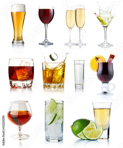 Photo: Set of alcohol drinks in glasses isolated on white Set of alcohol drinks in glasses isolated on white