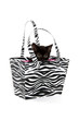 Black kitten in a bag