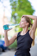 Thirsty sports woman
