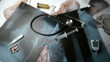 Syringe falling over x ray next to medical tools