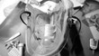 Medical mask falling over medical tools in black and white