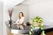 Photo: Smiling woman at office reception Smiling woman at office reception