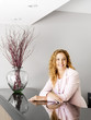Smiling woman at office reception