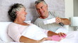 Man giving a present to his wife