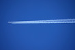 airplane and vapour trail