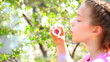 little girl with soap bubbles