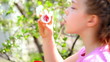 little girl with soap bubbles