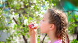 little girl with soap bubbles