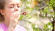little girl with soap bubbles