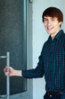 young man going to enter