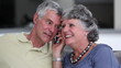 Mature couple having a phone conversation 