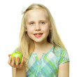 Healthy eating concept, smiling child girl holding green apple,