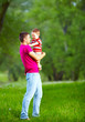 Photo: happy father and son playing in spring forest happy father and son playing in spring forest