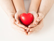 woman and man hands with heart