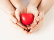 woman and man hands with heart