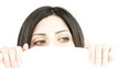 Beautiful woman playing hiding with pillow