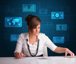 Businesswoman doing paperwork with digital background
