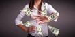 Young girl throwing money