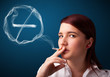 Young lady smoking unhealthy cigarette with no smoking sign