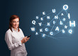 Young woman typing on smartphone with high tech 3d letters commi