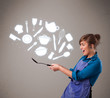 Young woman with kitchen accessories icons