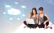 Photo: Happy girls looking at modern cloud network Happy girls looking at modern cloud network