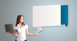 attractive woman holding a laptop and presenting modern origami