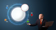businessman holding a laptop and presenting abstract modern pie