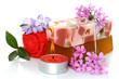Spa composition of handmade soap, towel, flowers and candle 