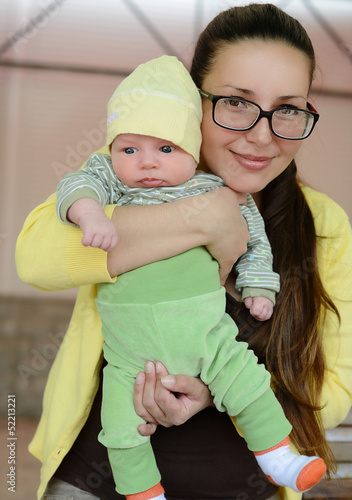 Photo: mother holding baby mother holding baby