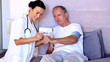 Home nurse pleased with patients blood pressure
