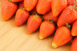 Fresh strawberries on wooden background