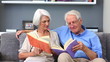 Elderly couple reading books