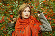 Photo: Beautiful woman in autumn foliage, fashion portrait Beautiful woman in autumn foliage, fashion portrait