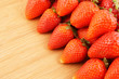 Fresh strawberries on wooden background