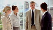 Team of business people discussing together