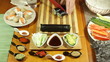 Closeup of cutting Sushi roll