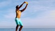 Attractive man playing frisbee