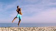 Attractive man catching a frisbee