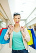 Shopping time, sexy girl winking and smiling