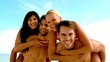Friends joking and having fun on the beach