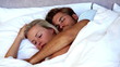 Couple spooning in bed