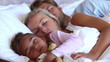 Parents and daughter sleeping peacefully