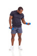Photo: african american man exercising with dumbbells african american man exercising with dumbbells