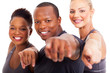group of gym instructors pointing at the camera
