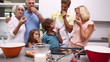 Family eating freshly baked homemade cookies